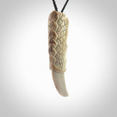 Hand carved incredible dragon claw Bone carving. A stunning work of art, beautifully replicating a dragon claw. This pendant was hand carved in bone by Fumio Noguchi. A one off collectors item that has been hand crafted to be worn or displayed.